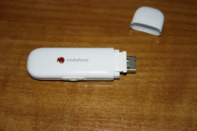 Huawei USB GSM modem with SIM card slot visible
